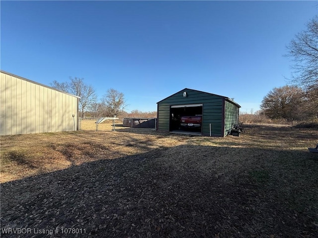 view of outbuilding with a garage