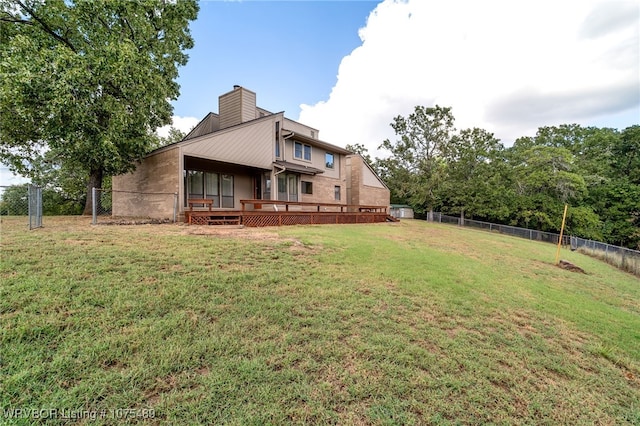 view of yard featuring a wooden deck