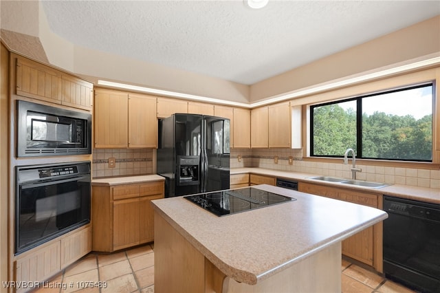 kitchen with backsplash, sink, black appliances, light tile patterned floors, and a kitchen island