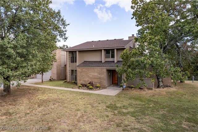 view of front of home with a front yard