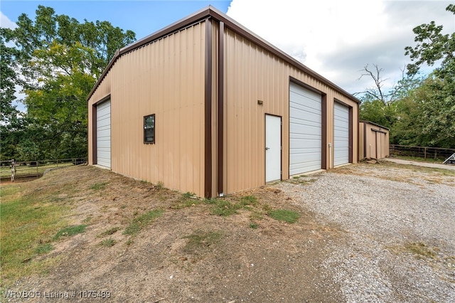 view of outdoor structure featuring a garage