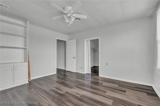 2101 N I St, Fort Smith, AR 72901 - unfurnished room featuring a ceiling fan, wood finished floors, and baseboards
