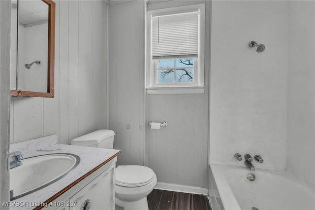 2101 N I St, Fort Smith, AR 72901 - full bath featuring toilet, vanity, and wood finished floors