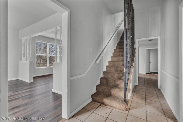 2101 N I St, Fort Smith, AR 72901 - stairs with baseboards and wood finished floors