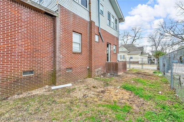 2101 N I St, Fort Smith, AR 72901 - view of home's exterior with brick siding and crawl space