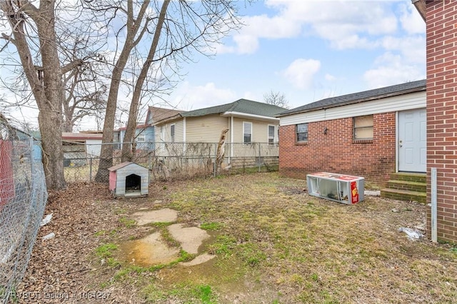 2101 N I St, Fort Smith, AR 72901 - fenced backyard featuring entry steps