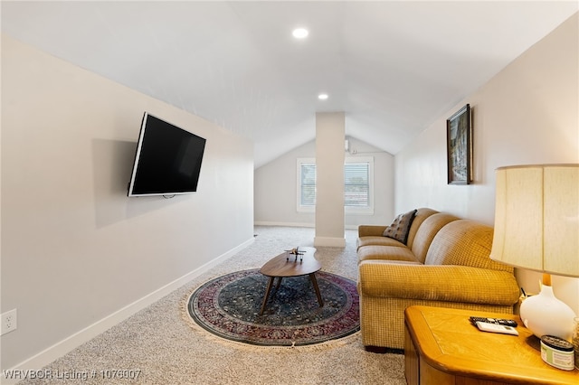 living room featuring carpet floors and lofted ceiling