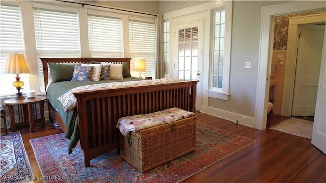 bedroom featuring dark wood-type flooring