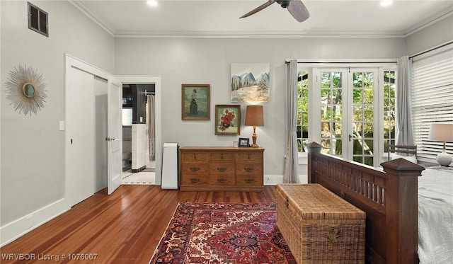 living area featuring french doors, dark hardwood / wood-style flooring, ceiling fan, and ornamental molding