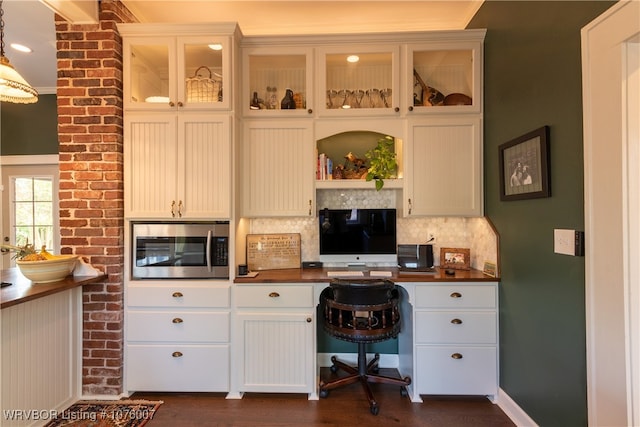 unfurnished office featuring dark hardwood / wood-style flooring