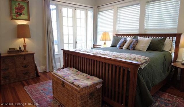 bedroom featuring dark hardwood / wood-style floors