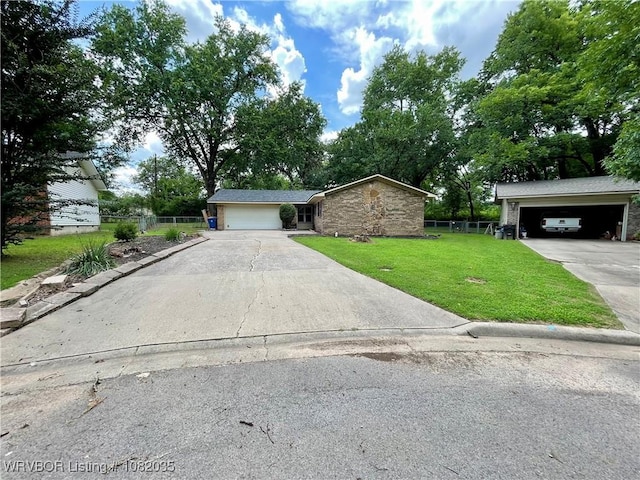 2119 55th Pl, Fort Smith, AR 72904 - view of front facade with a garage, driveway, and stone siding