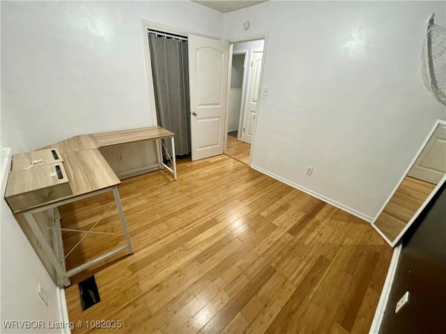 2119 55th Pl, Fort Smith, AR 72904 - unfurnished bedroom with light wood-type flooring and baseboards