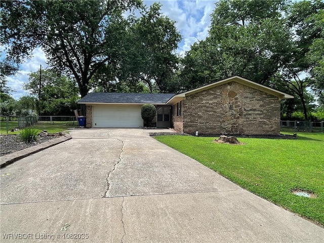 2119 55th Pl, Fort Smith, AR 72904 - single story home with brick siding, concrete driveway, and a garage