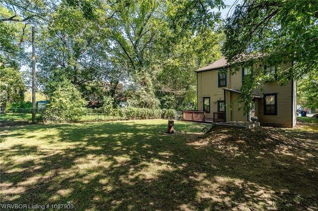 view of yard with a wooden deck