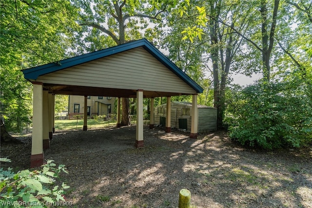 view of property's community with a storage shed