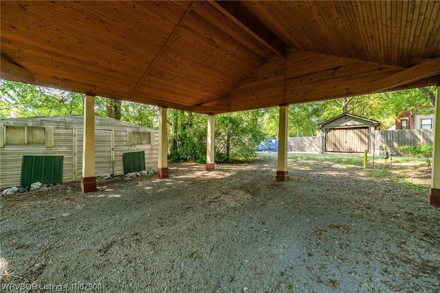 view of yard featuring a storage unit