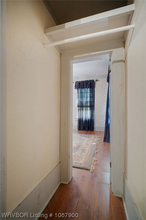 corridor featuring hardwood / wood-style floors