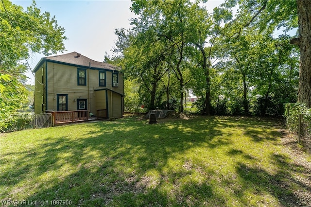 view of yard with a deck