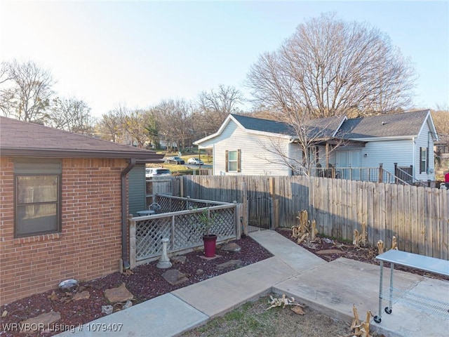 exterior space featuring a fenced backyard