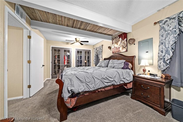 carpeted bedroom featuring visible vents, ceiling fan, baseboards, beam ceiling, and french doors