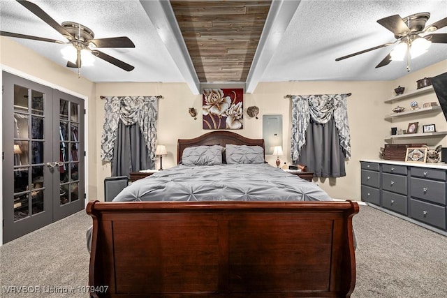 carpeted bedroom featuring a textured ceiling, french doors, and ceiling fan