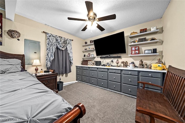 bedroom with ceiling fan, baseboards, dark carpet, and a textured ceiling