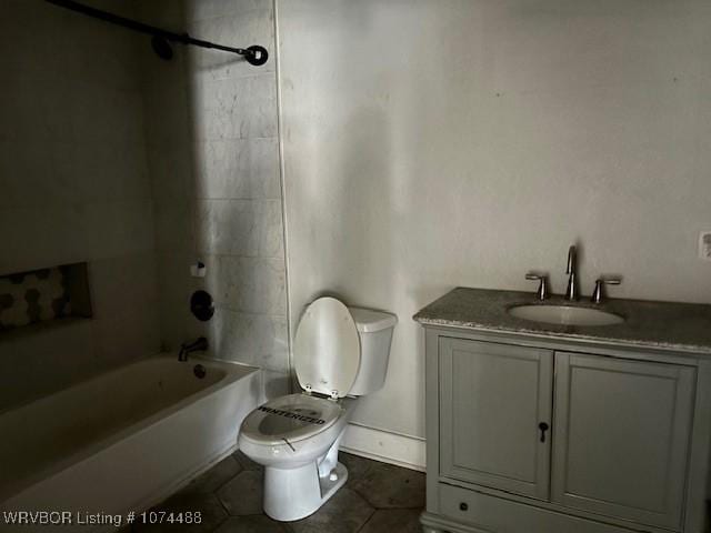 full bathroom with tile patterned flooring, vanity, toilet, and tiled shower / bath combo