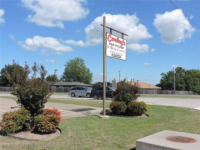 exterior details with fence and parking