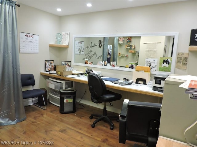 office space with recessed lighting and wood finished floors