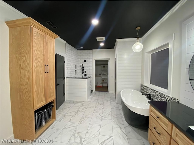 bathroom with ornamental molding, plus walk in shower, and vanity