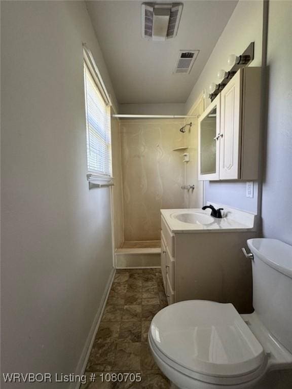 full bathroom featuring visible vents, walk in shower, vanity, baseboards, and toilet