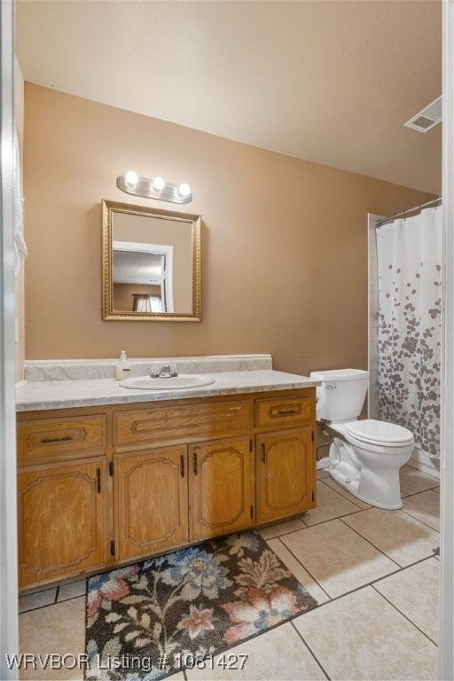3500 N 48th St, Fort Smith, AR 72904 - full bath with vanity, toilet, and tile patterned floors