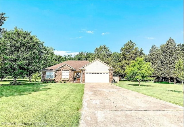 ranch-style home with a garage and a front yard