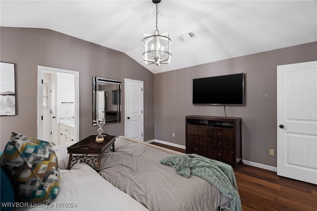 bedroom with a chandelier, vaulted ceiling, ensuite bath, and dark wood-type flooring