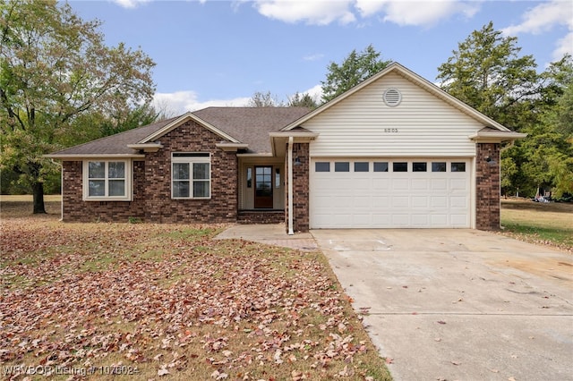 ranch-style home with a garage