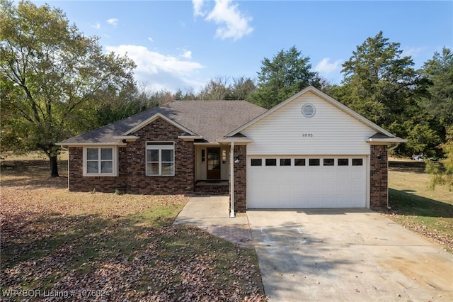 single story home with a garage