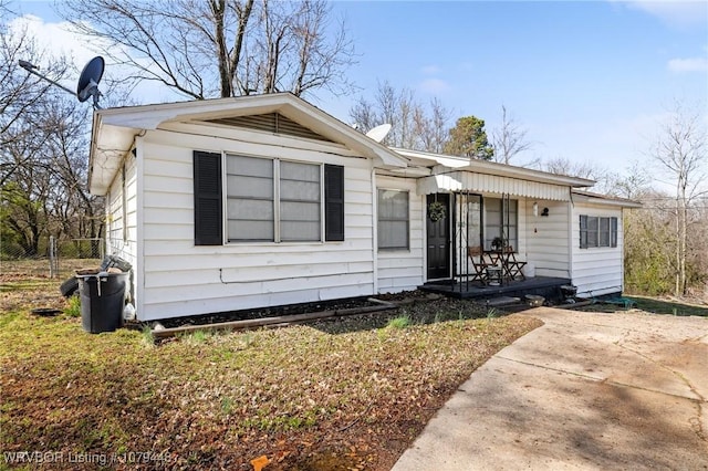 view of front of home with fence