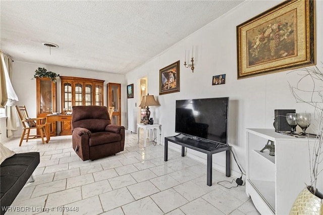 living room featuring a textured ceiling, marble finish floor, and visible vents