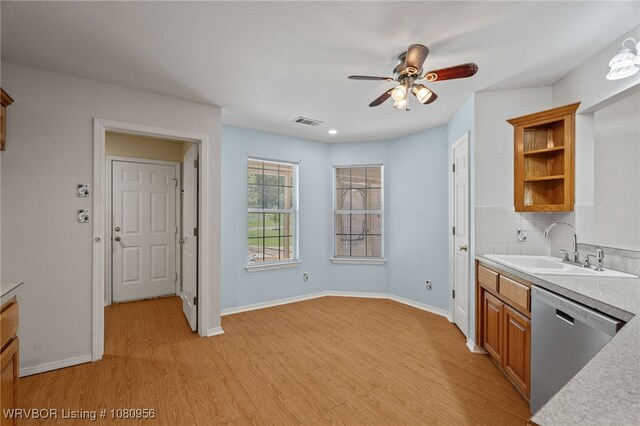 813 Melba Denton Ln, Sallisaw, OK 74955 - kitchen featuring stainless steel dishwasher, a sink, open shelves, light countertops, and light wood-type flooring