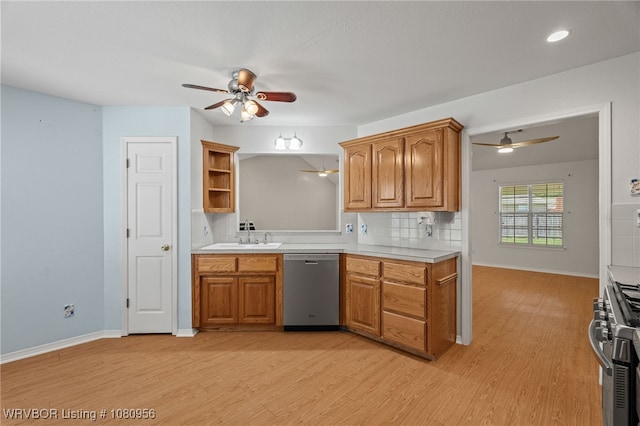 813 Melba Denton Ln, Sallisaw, OK 74955 - kitchen with appliances with stainless steel finishes, ceiling fan, a sink, and light countertops