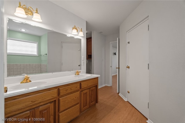 813 Melba Denton Ln, Sallisaw, OK 74955 - full bathroom featuring wood finished floors and double vanity