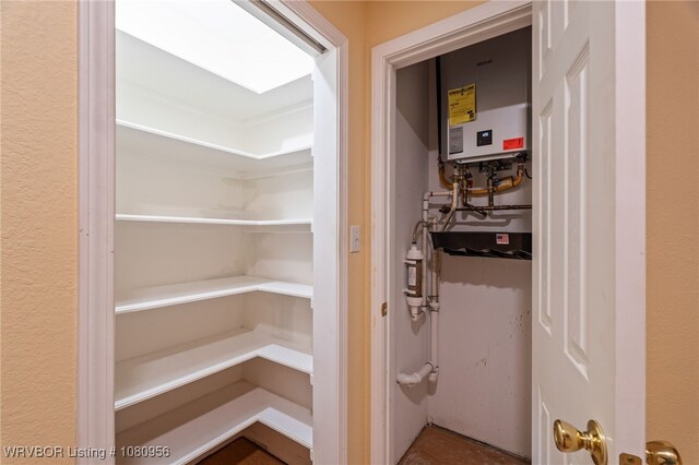 813 Melba Denton Ln, Sallisaw, OK 74955 - pantry with tankless water heater