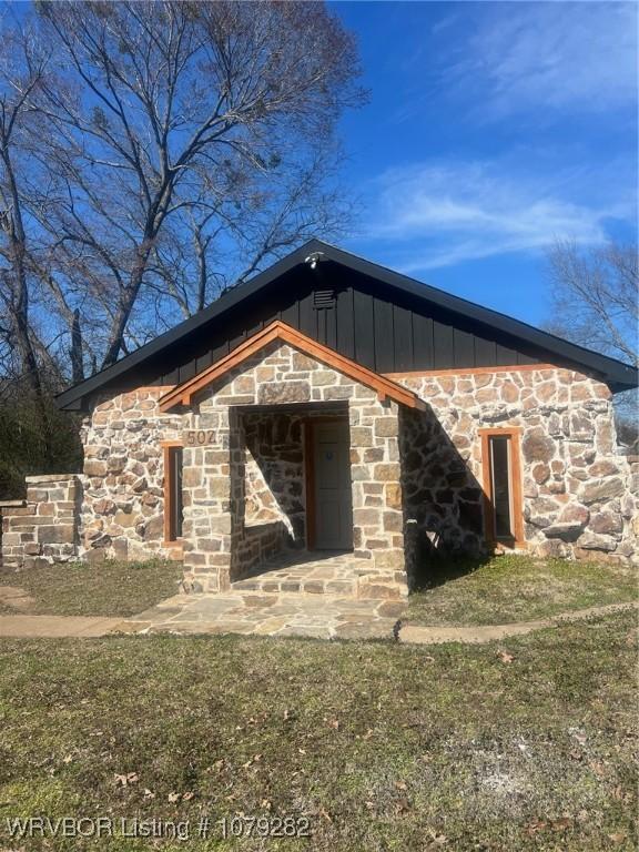 view of home's exterior with board and batten siding