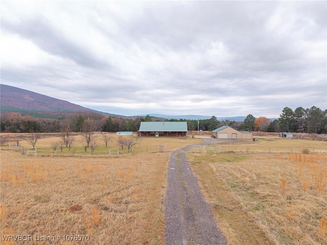 view of road with a mountain view and a rural view