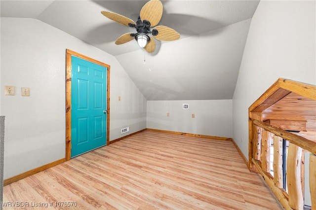 bonus room with ceiling fan, light hardwood / wood-style flooring, and lofted ceiling