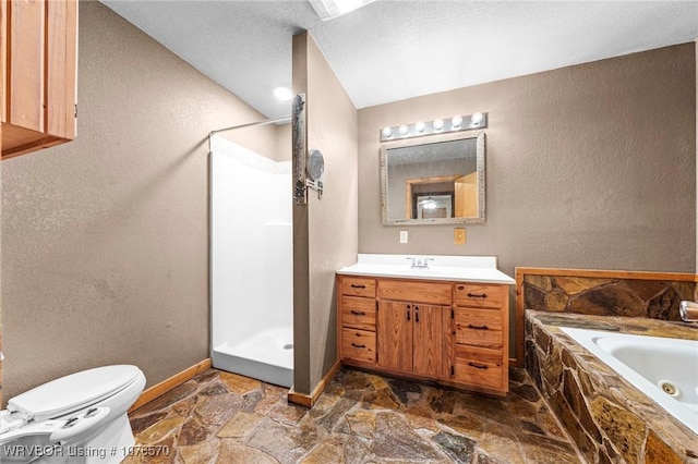 full bathroom featuring shower with separate bathtub, vanity, a textured ceiling, and toilet