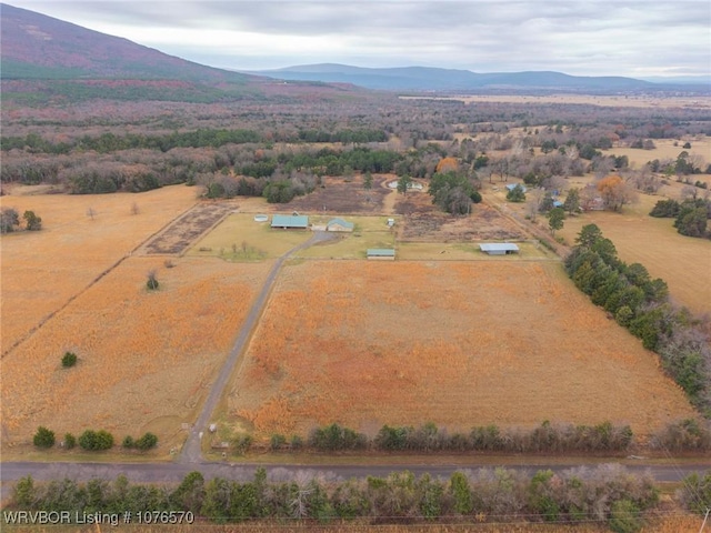 aerial view with a mountain view and a rural view