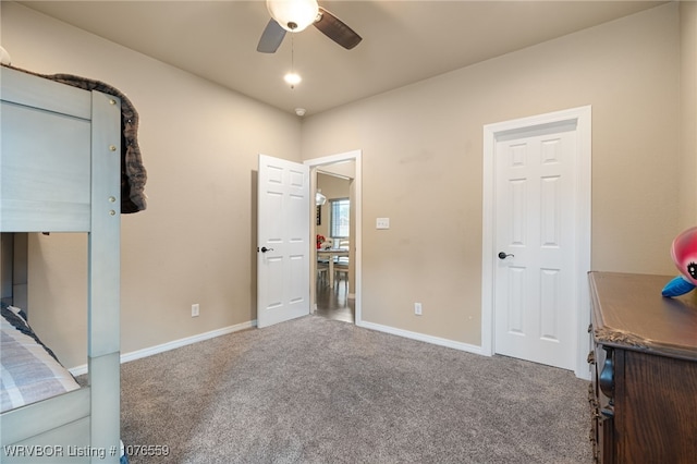 unfurnished bedroom with carpet flooring and ceiling fan