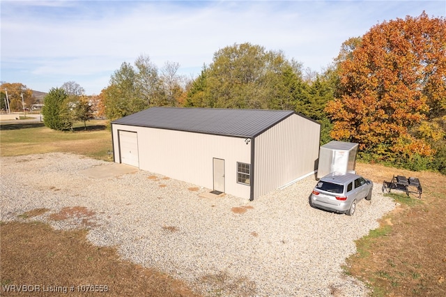 view of outdoor structure with a garage